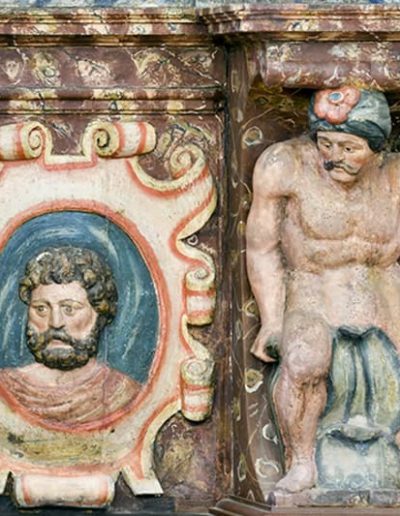 Retablo mayor. Tenante y busto de hombre